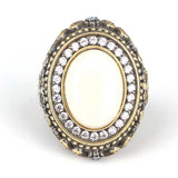 Anillo premium para hombre de plata de ley con circonio marfil y aguamarina