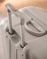 Large Beige Hardshell Rolling Travel Suitcase