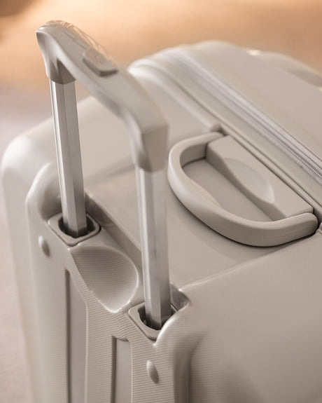 Large Beige Hardshell Rolling Travel Suitcase