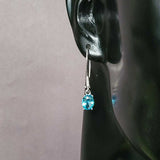 Sterling Silver Petite Oval Aquamarine Zircon Dangle Earrings