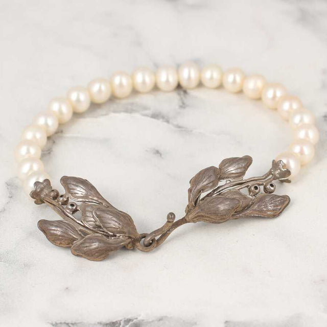 Elegant 925 Sterling Silver Pearl Bracelet with Leaf Clasp Design