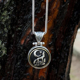 Sterling Silver Rotating Crescent & Wolf Symbol Necklace