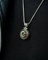Sterling Silver Crescent & Star Necklace with Rotating Red Stone