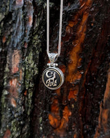 Sterling Silver Rotating Crescent & Wolf Symbol Necklace