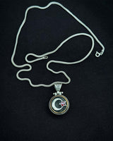 Sterling Silver Crescent & Star Necklace with Rotating Red Stone