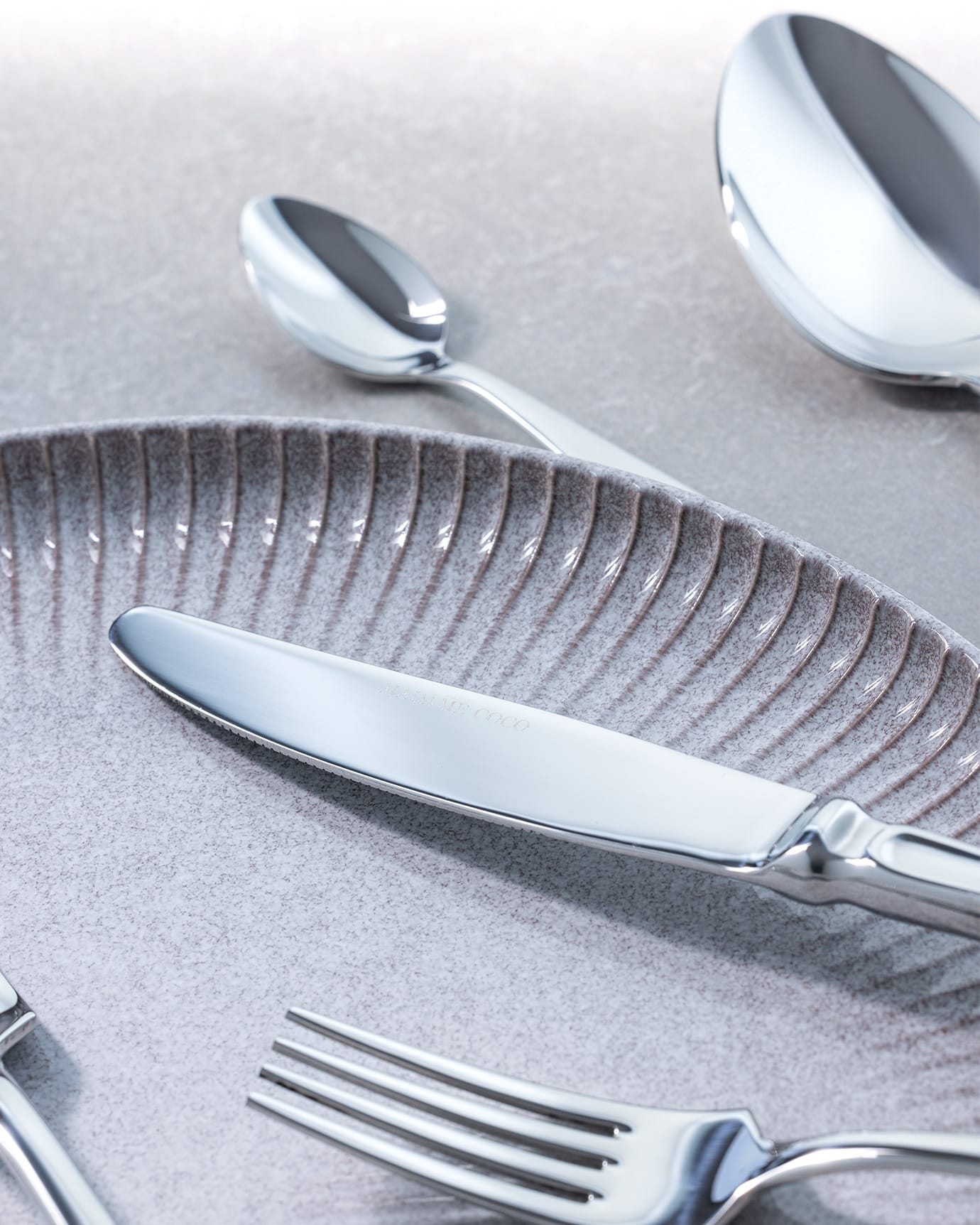 Stainless Steel 42-Piece Flatware Set - Elegant Silver Design