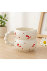 Ceramic Mug - Handcrafted with Bow Design & Beaded Handle