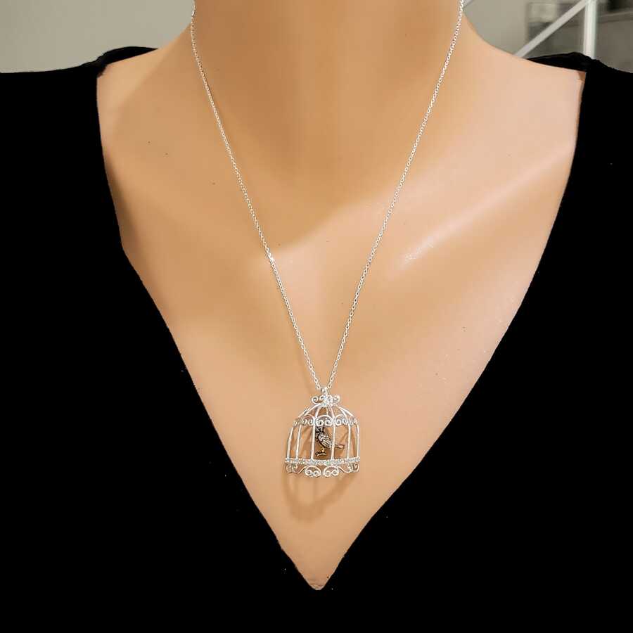 Sterling Silver Bird in Cage Necklace - Whimsical & Timeless Design