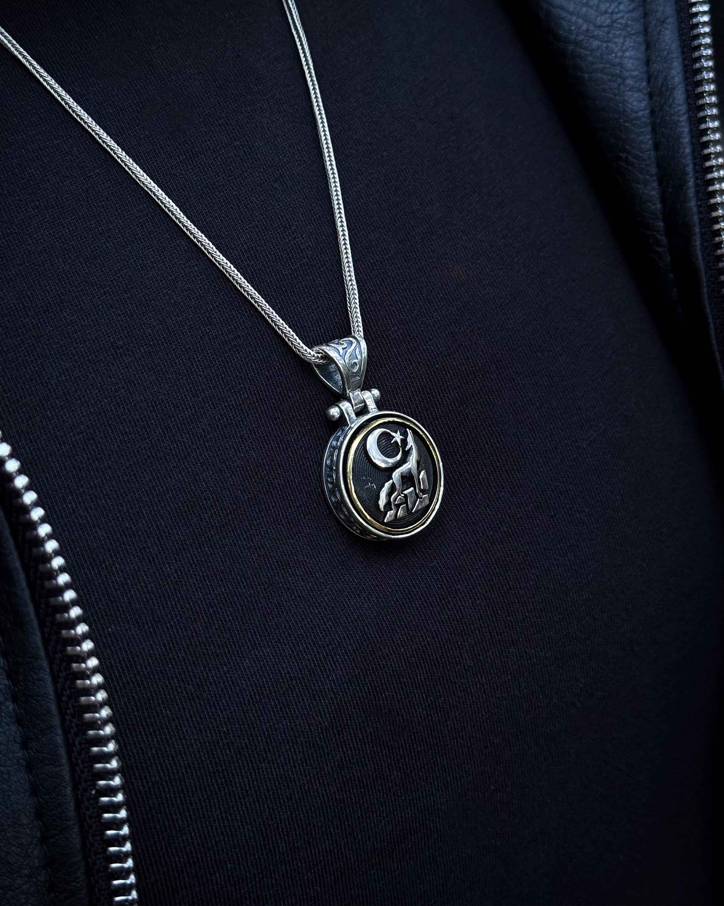 Sterling Silver Rotating Crescent & Wolf Symbol Necklace
