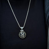 Sterling Silver Rotating Crescent & Wolf Symbol Necklace