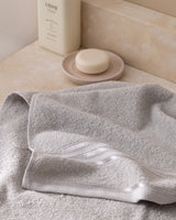 100% Cotton Plush Face Towel with Decorative Border - Light Gray