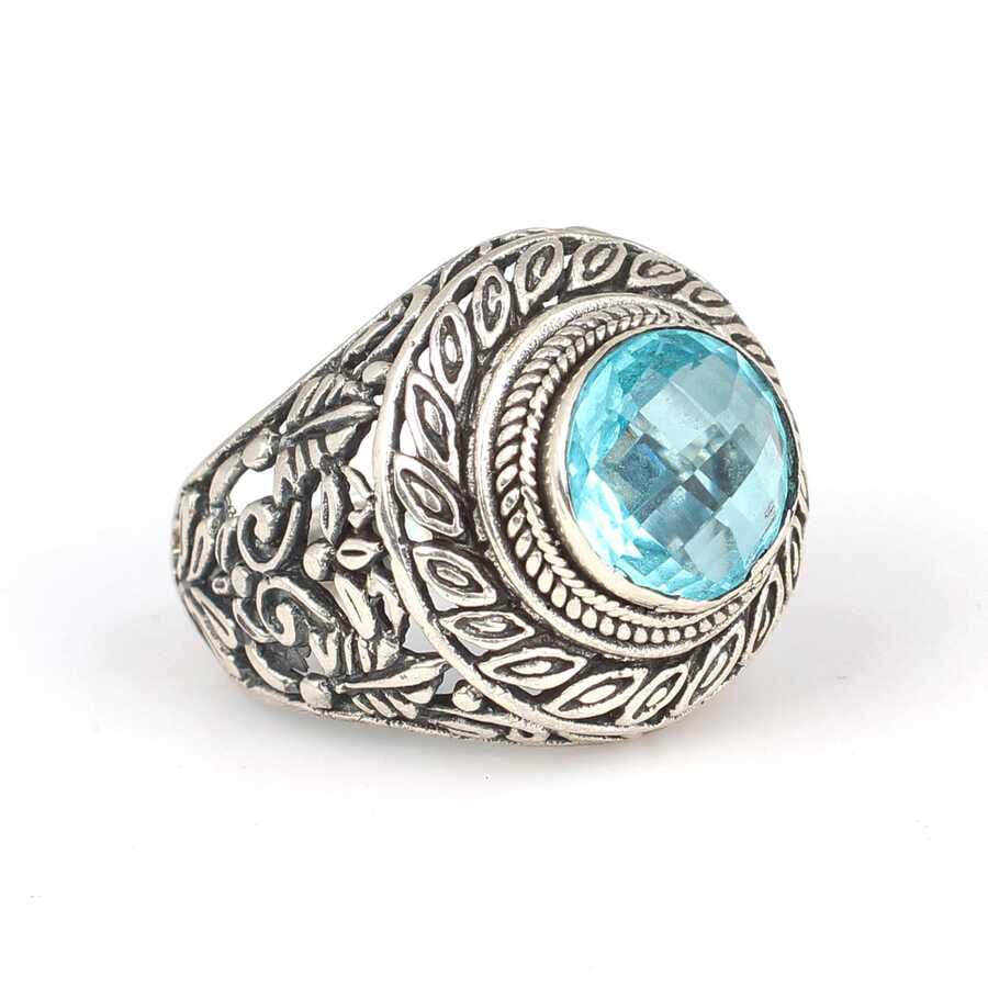 Anillo llamativo de hoja calada con aguamarina en plata de ley 925