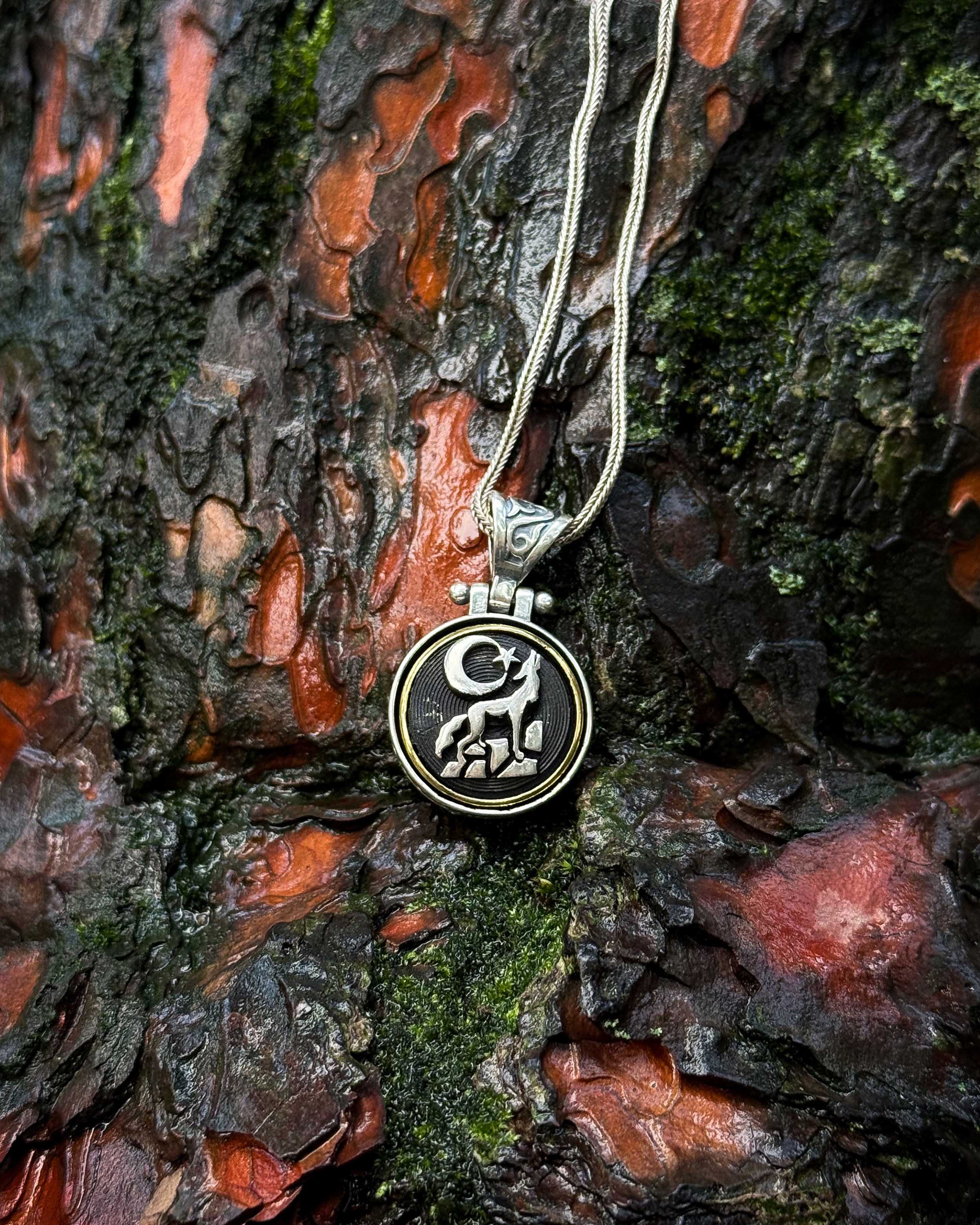 Sterling Silver Rotating Crescent & Wolf Symbol Necklace