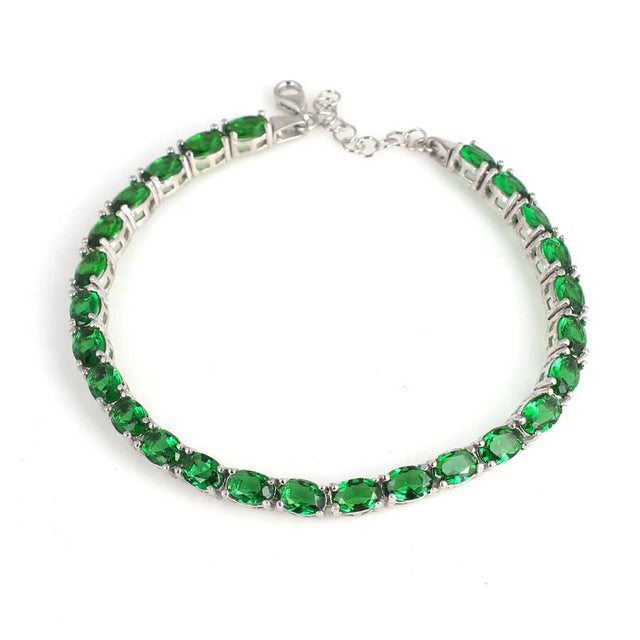 Sterling Silver Small Oval Synthetic Emerald Line Bracelet
