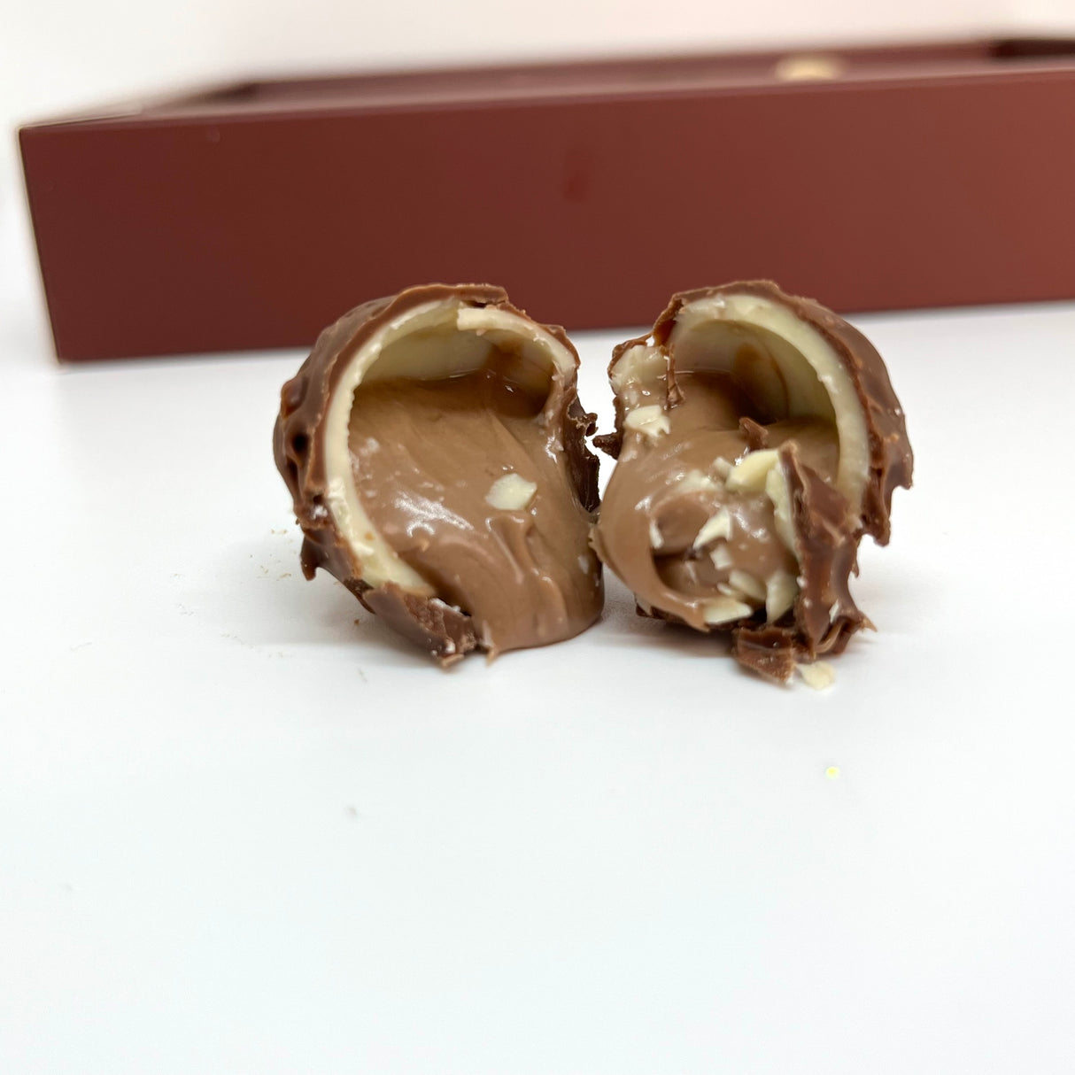 Ema Chocolate Milk and White Chocolate Truffles with Hazelnut Cream Filled- Merry Christmas Box - 250g