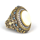 Anillo premium para hombre de plata de ley con circonio marfil y aguamarina