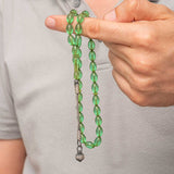 Tesbih – Grüner gepresster Bernstein-Gebetsrosenkranz mit silberner Kazaz-Quaste