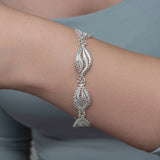Armbånd i sterlingsølv med filigranbladmotiv - Elegant design