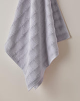 Serviette de bain en coton pelucheux de qualité professionnelle Lilas tissage bulles 70x140cm