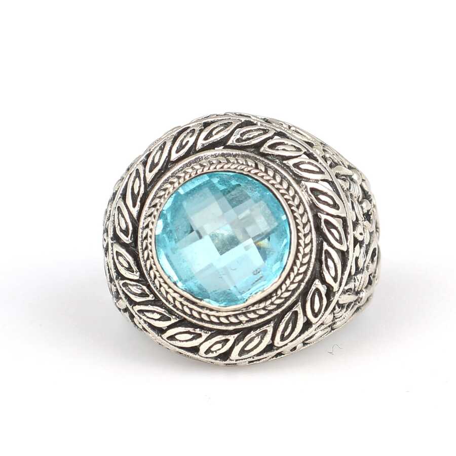 Anillo llamativo de hoja calada con aguamarina en plata de ley 925