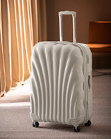 Large Beige Hardshell Rolling Travel Suitcase