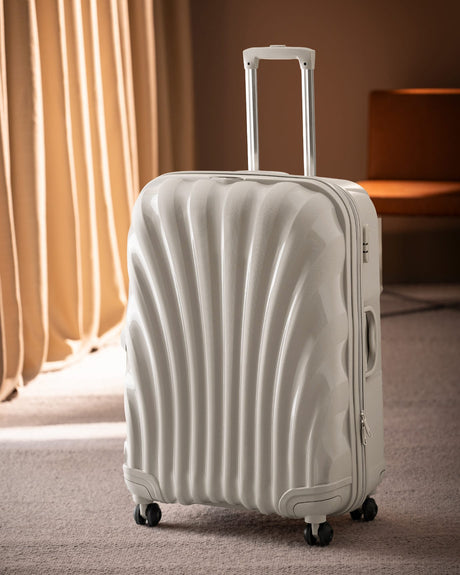 Large Beige Hardshell Rolling Travel Suitcase