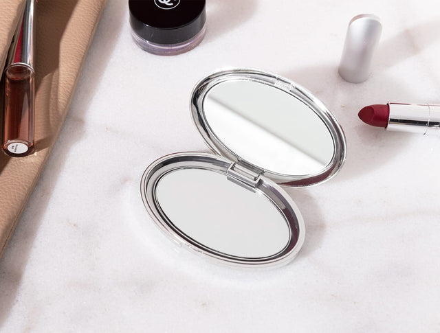 Sleek Silver Dual-Magnification Compact Mirror - Portable Design