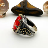 خاتم رجالي بحجر تورمالين أحمر بيضاوي