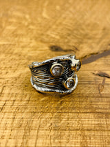 Anello regolabile da donna con tre pietre di zircone bianco