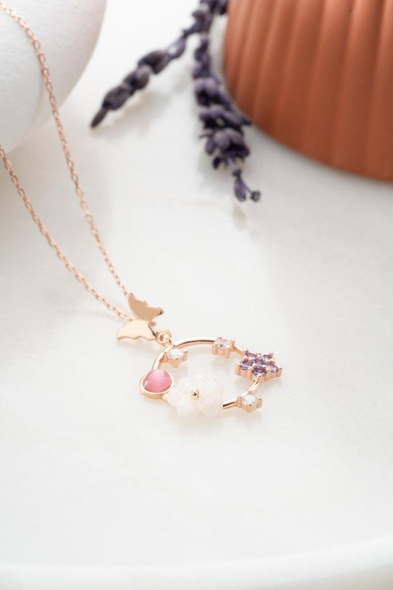 Nereze | Magnolia Blossom Circle Spring Flower Necklace with Butterfly Detail - TryAladdin