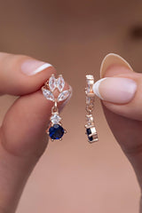 NRZ | 925K Sterling Silver Shuttle Zirconia Stone with Dangling Blue Solitaire Earrings