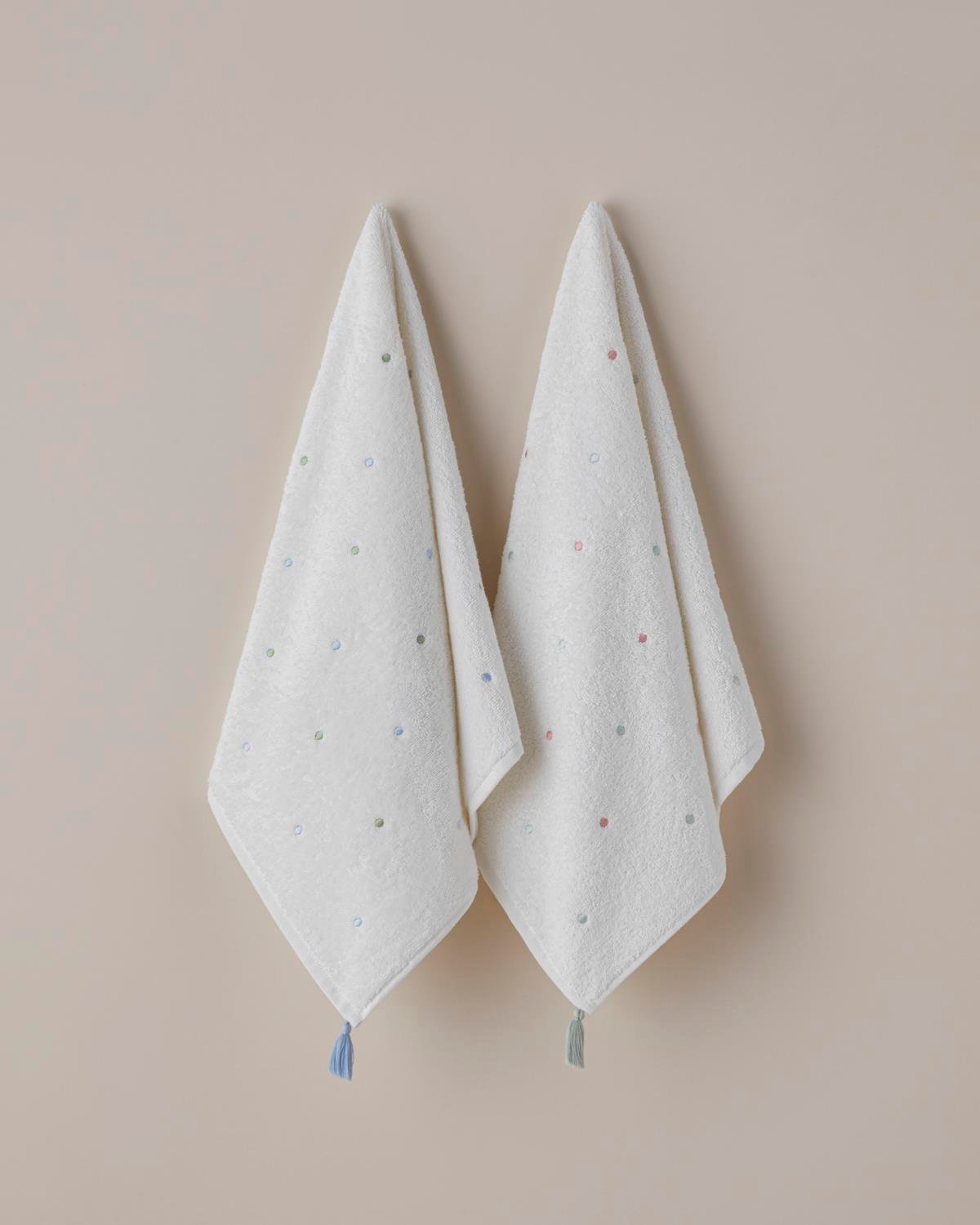 Asciugamano a mano in cotone premium con nappine e pois verde blu