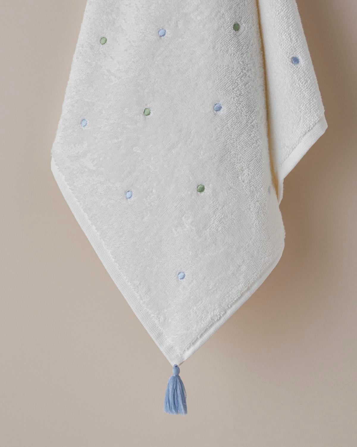 Asciugamano a mano in cotone premium con nappine e pois verde blu