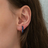 Boucles d'oreilles créoles - Ton or rose pavé de pierres bleues style allongé