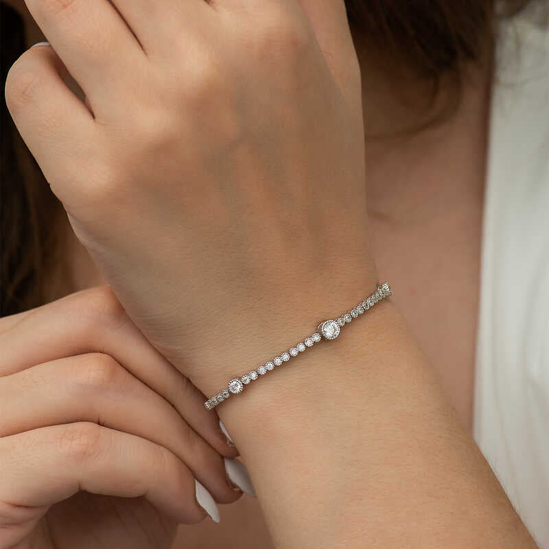 Sterling Silver Tennis Bracelet - Three Bezel Set Cubic Zirconia Accents