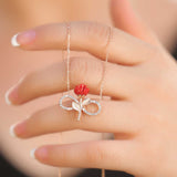 Rose Gold-Tone Infinity Rose Necklace - Sparkling & Romantic
