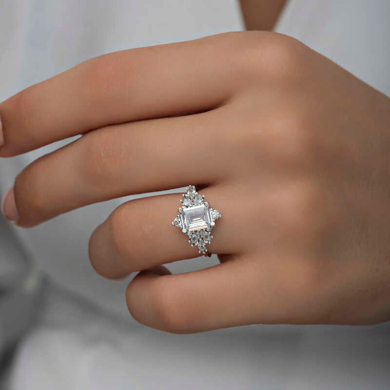 Silver Ring - Sparkling Emerald Cut & Cluster Clear Stone Design