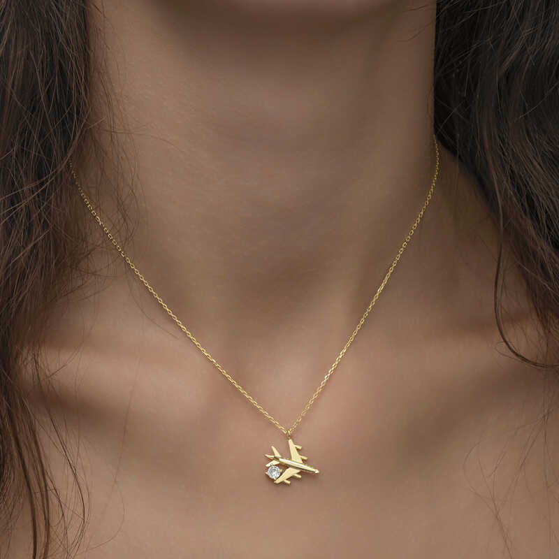 Gold-Tone Airplane Charm Necklace - Clear Stone Accent