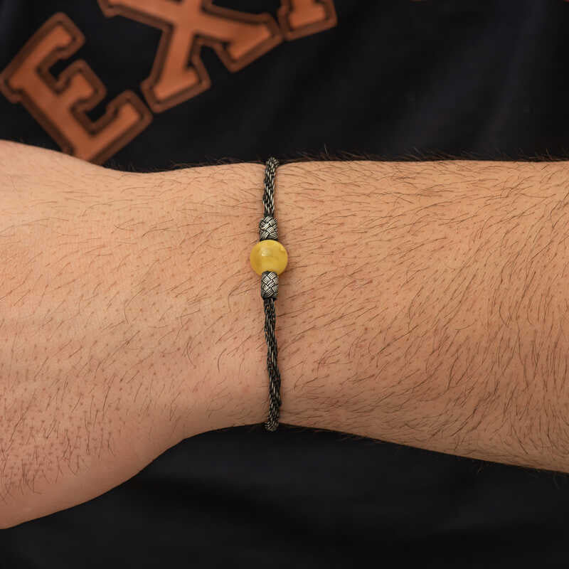 Bracciale intrecciato Kazaziye in argento sterling con perla di ambra naturale