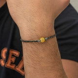 Bracciale intrecciato Kazaziye in argento sterling con perla di ambra naturale