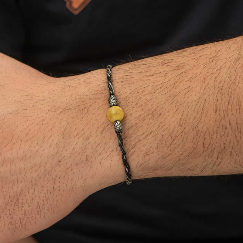 Bracciale intrecciato Kazaziye in argento sterling con perla di ambra naturale