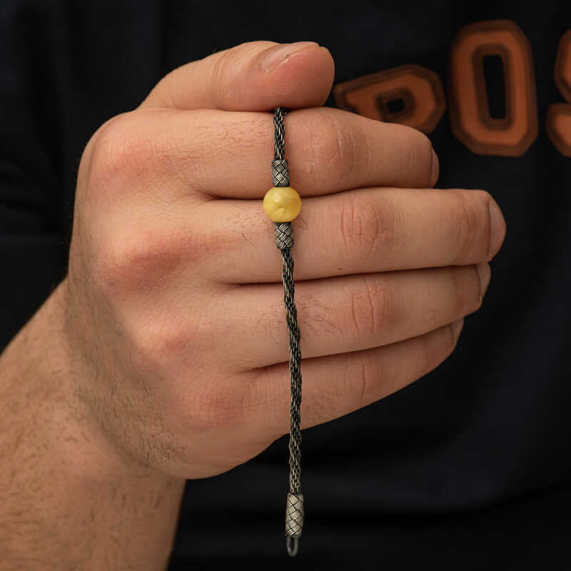 Bracciale intrecciato Kazaziye in argento sterling con perla di ambra naturale