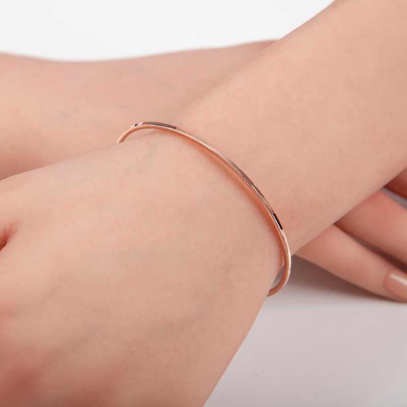 Rose-Tone Flexible Bangle Bracelet - Dainty Coiled Design