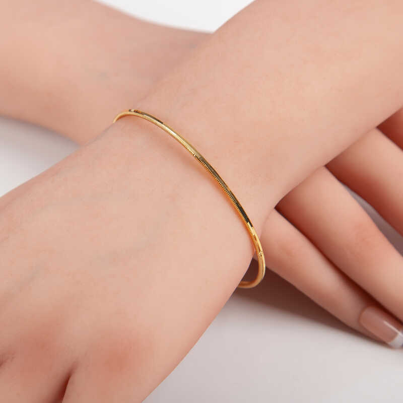 Bangle Bracelet - Gold-Tone Flexible Ribbed Design