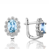 Sterling Silver Blue Topaz & CZ Floral Halo Earrings