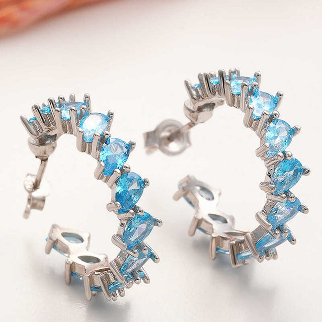 Dainty Silver Aquamarine Pear Cut Crescent Stud Earrings