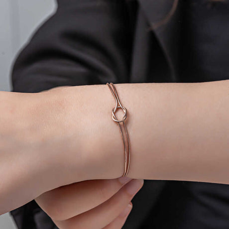 Rose Gold Tone Love Knot Bracelet - Minimalist & Elegant