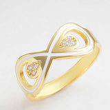 Infinity Ring - Gold-Tone Zirconia & White Enamel Elegance
