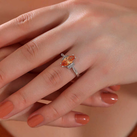 Elegant Silver-Tone Ring with Marquise Peach Zircon and Pave Accents