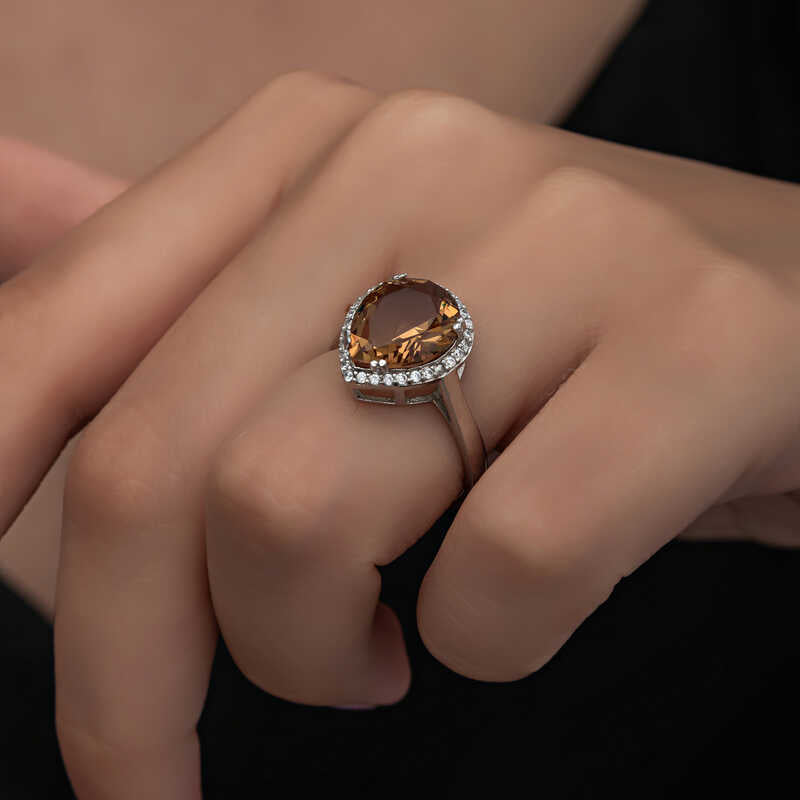 Sterling Silver Zultanite Pear-Cut Halo Ring - Statement Elegance